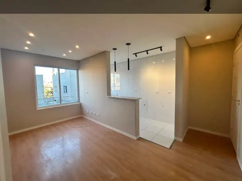 Sala com a cozinha americana